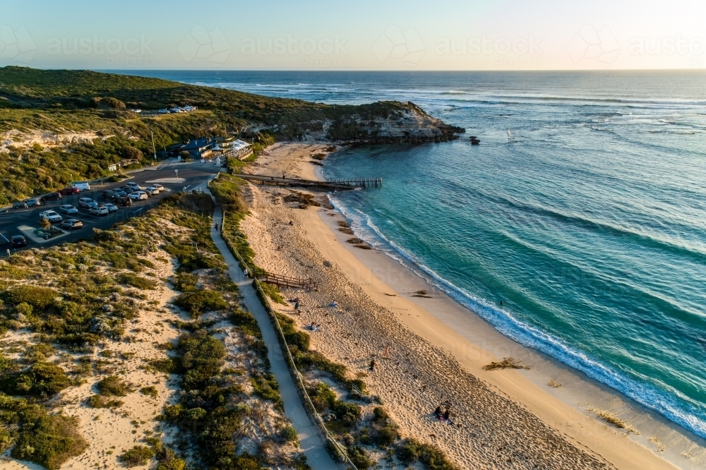 Aerial view of coastal path, headland, and ocean - Australian Stock Image