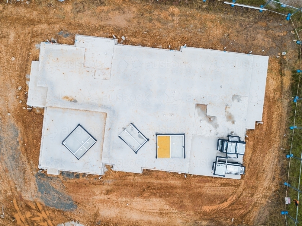 Aerial view of concrete slab for new house build - Australian Stock Image