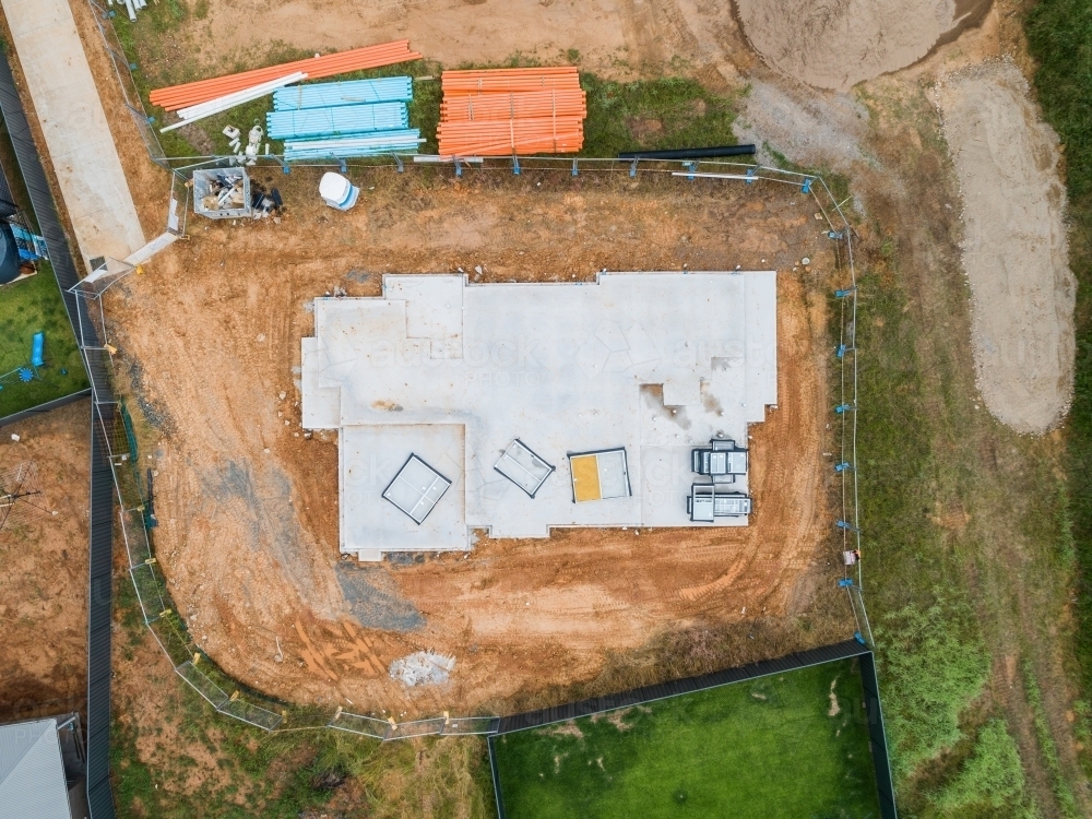 Aerial view of concrete slab for new house build - Australian Stock Image