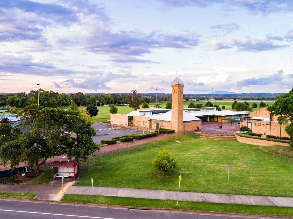 Aerial view of council building civic centre and clock tower with green and footpath - Australian Stock Image