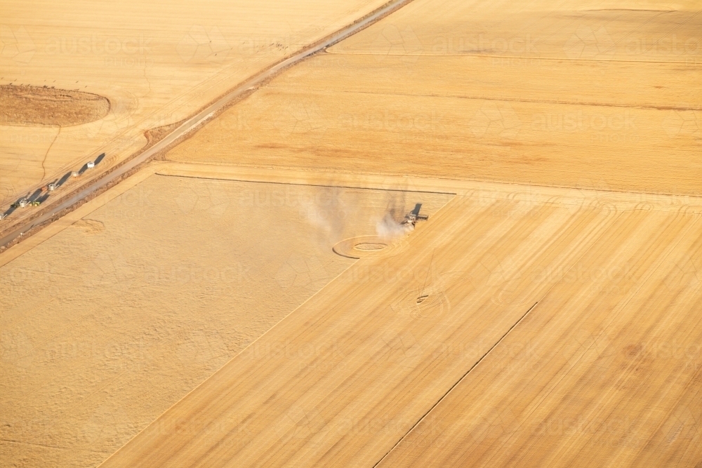 aerial view of crops being harvested - Australian Stock Image