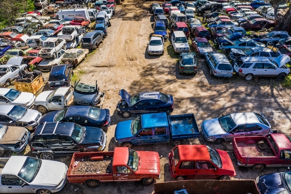 Aerial view of damaged car bodies at an auto wreckers - Australian Stock Image