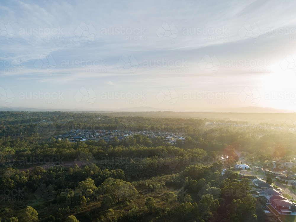 Aerial view of edge of town where bush meets developed land in Singleton - Australian Stock Image