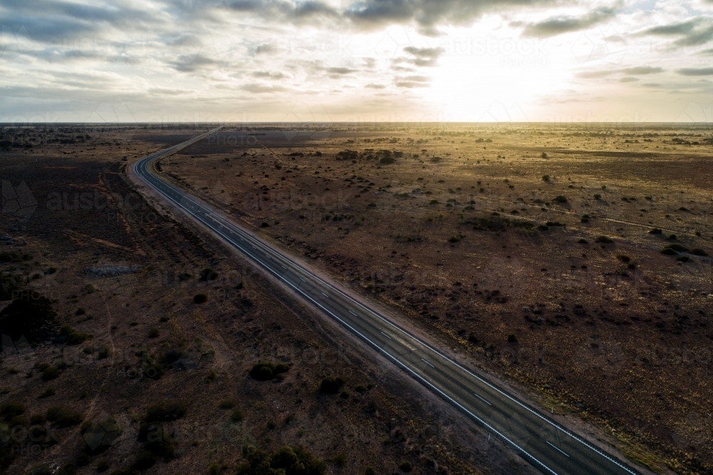 Aerial view of Eyre Highway and Nullarbor Plain near Cocklebiddy, Western Australia. - Australian Stock Image