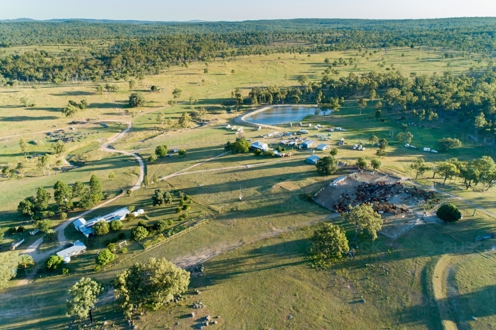 Aerial view of farm homestead and cattle yards. - Australian Stock Image