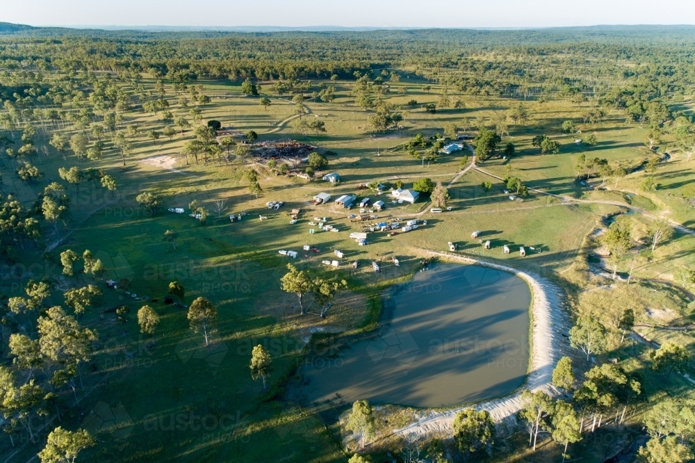 Aerial view of farm homestead, cattle yards, dam, and camp sites. - Australian Stock Image