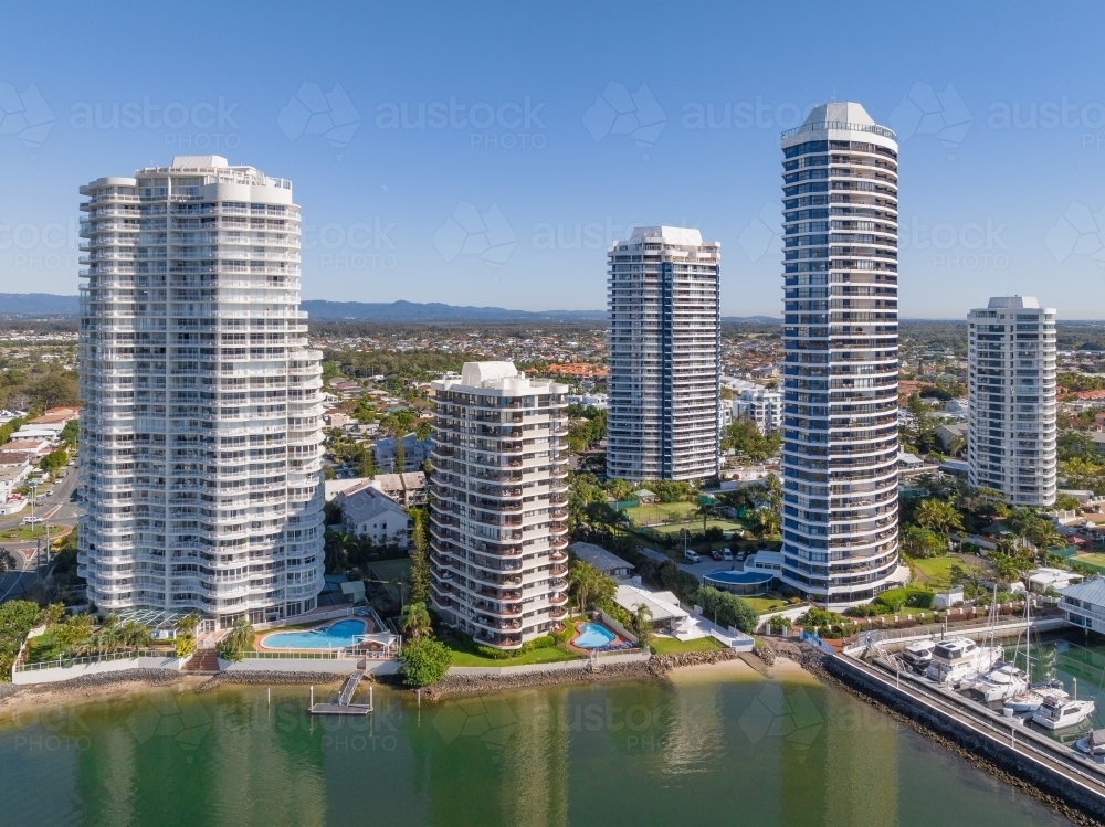 Aerial view of high rise apartment towers along a waterfront esplanade - Australian Stock Image