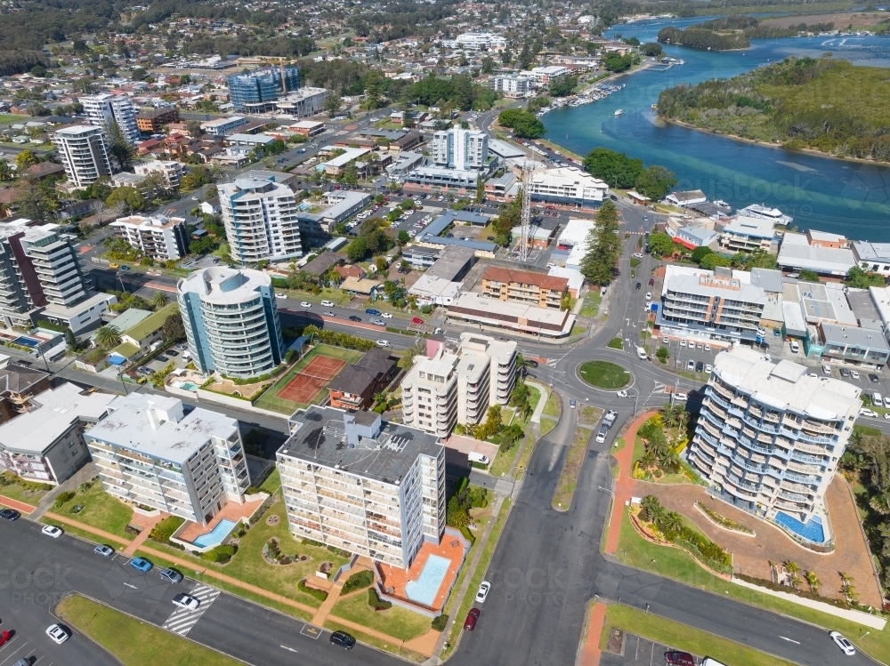 Aerial view of high rise waterfront buildings along side a river - Australian Stock Image