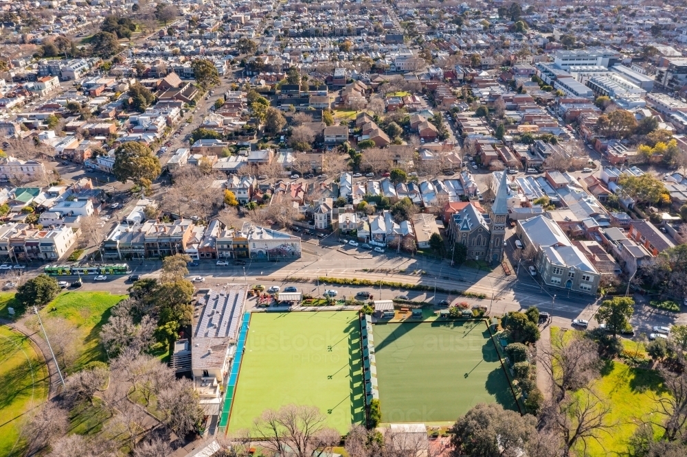 Aerial view of historic buildings around a suburban park and bowling green - Australian Stock Image