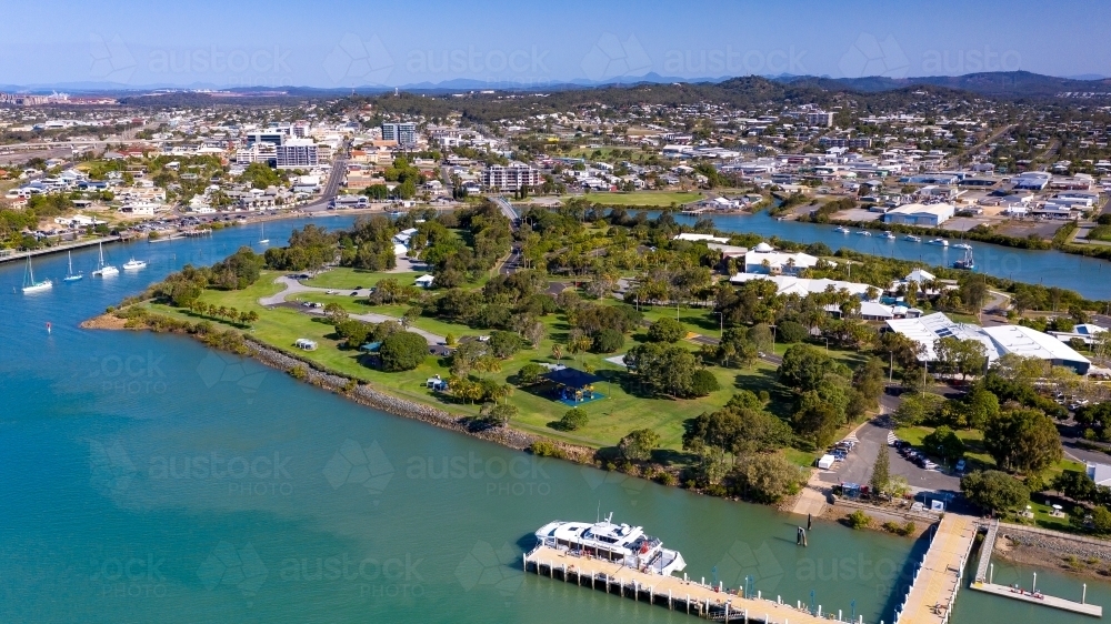 Aerial view of marina and university with city in background - Australian Stock Image