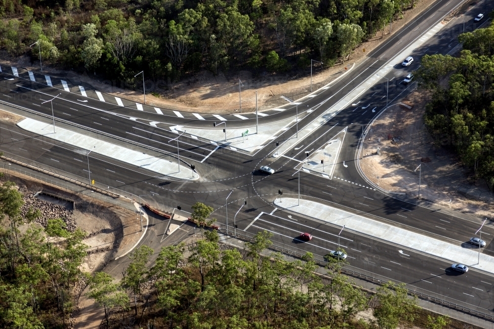 Aerial view of new roads surrounded by bushland - Australian Stock Image