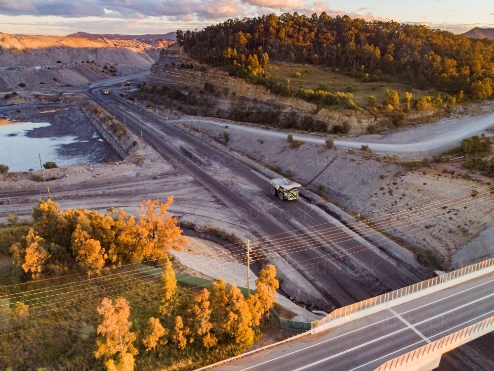 Aerial view of open cut coal mine with water near Singleton - Australian Stock Image