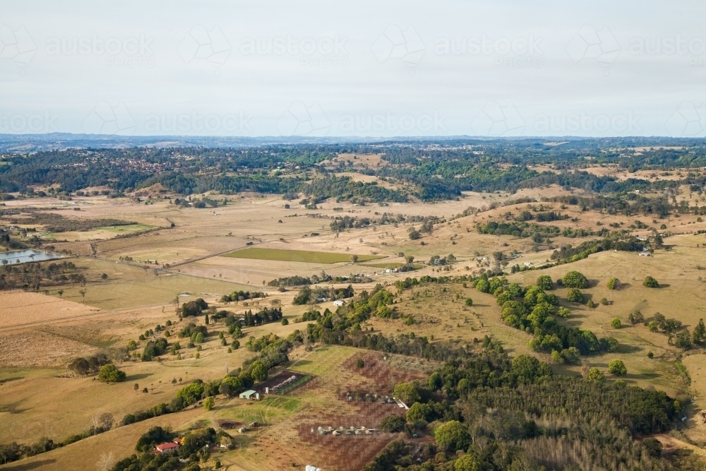 Aerial view of paddocks and trees on australian farmland - Australian Stock Image