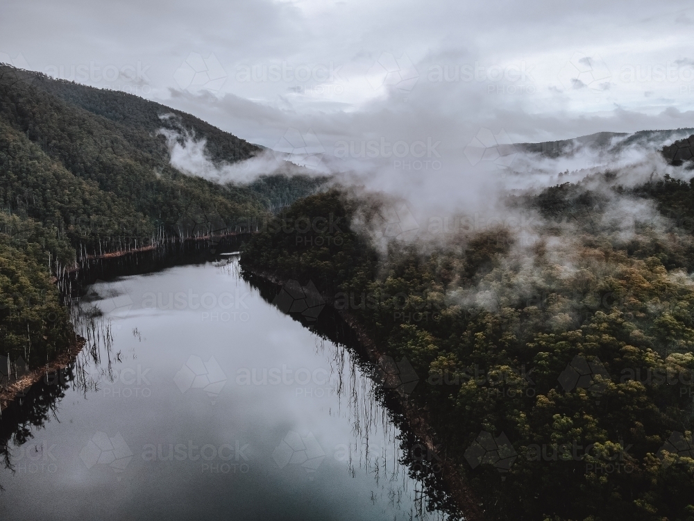 Aerial view of river with overcast sky - Australian Stock Image