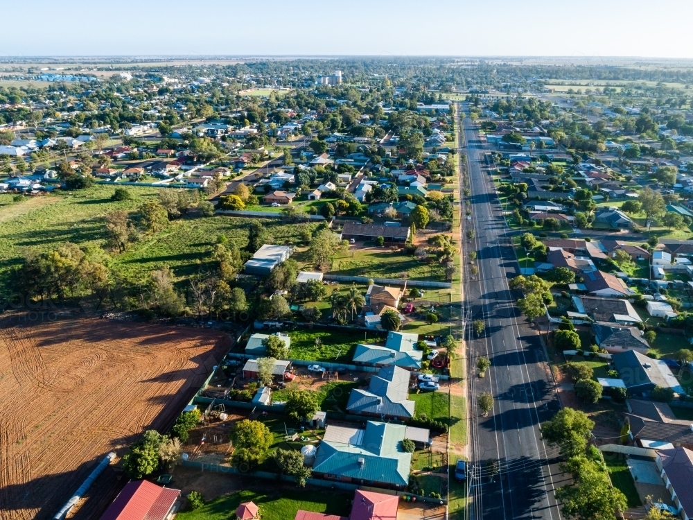 Image Of Aerial View Of Small Aussie Town With Houses Backing Onto 