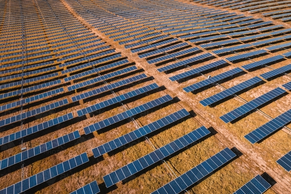 Aerial view of solar farm panels for renewable energy. - Australian Stock Image