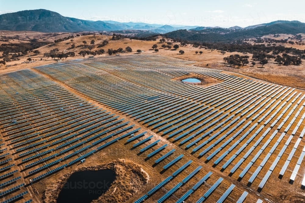 Aerial view of solar farm panels for renewable energy. - Australian Stock Image