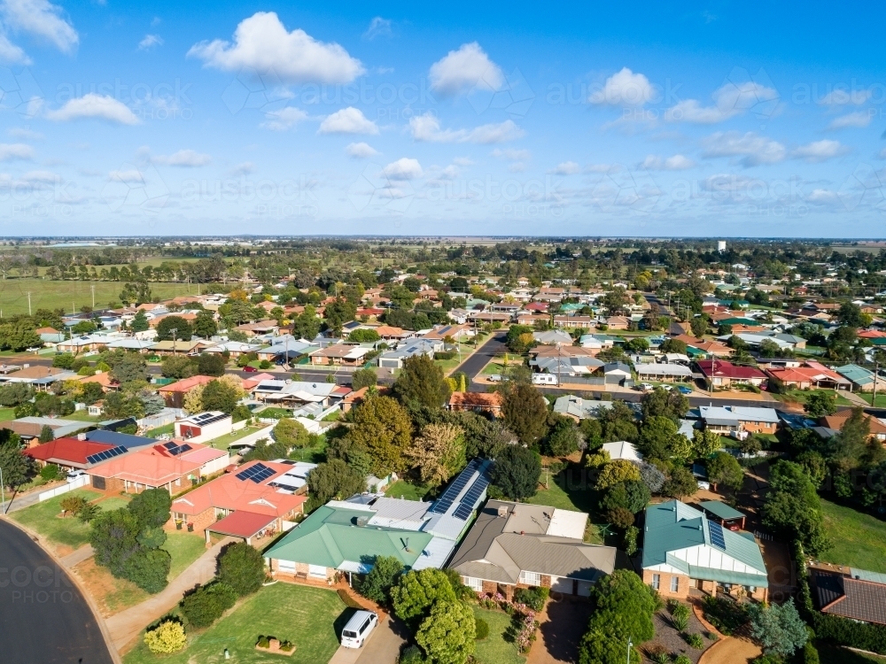 Aerial view of streets and houses in country town of Narromine in NSW on sunlit day - Australian Stock Image