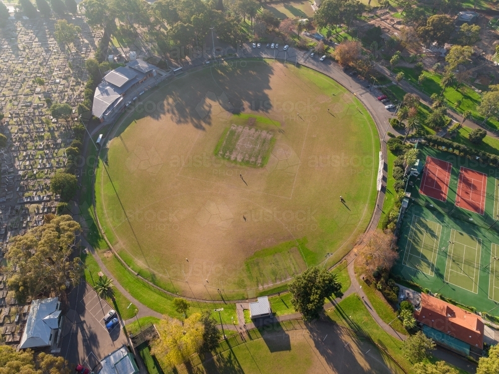 Aerial view of suburban sports ovals and tennis courts - Australian Stock Image