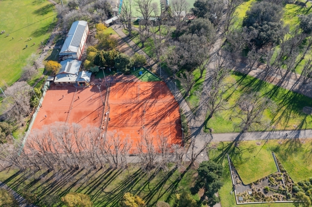 Aerial view of tennis courts and sports ovals in a city park - Australian Stock Image