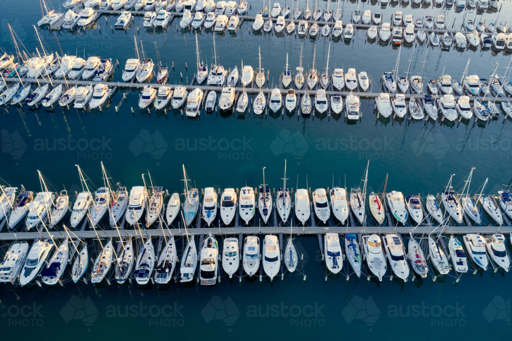 Aerial view of yachts moored in rows in a marina in Fremantle - Australian Stock Image