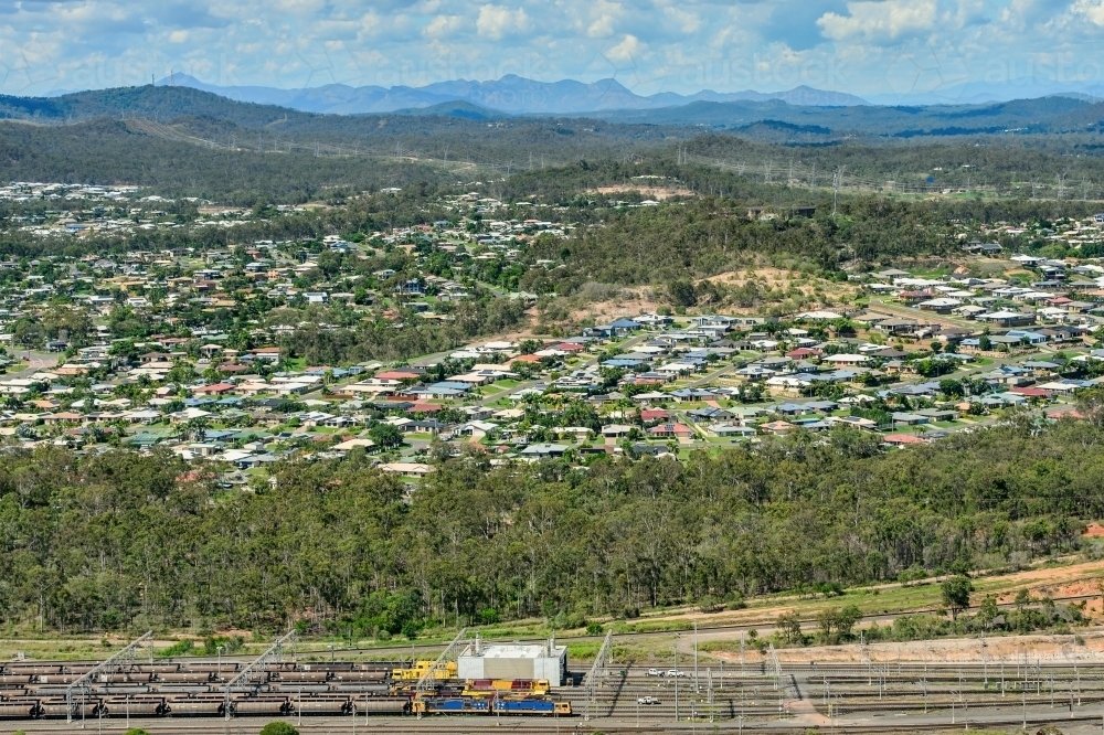 Aerial view towards Clinton suburb with coal trains in the foreground - Australian Stock Image