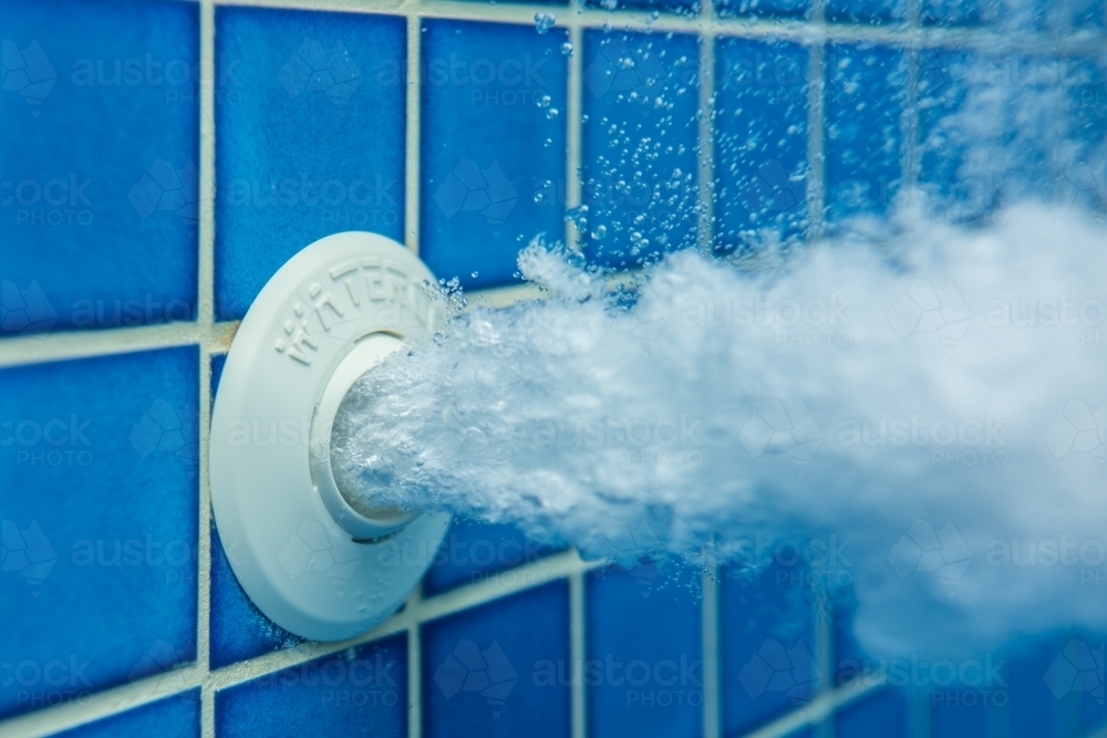 Air blowing through a spa water jet - Australian Stock Image