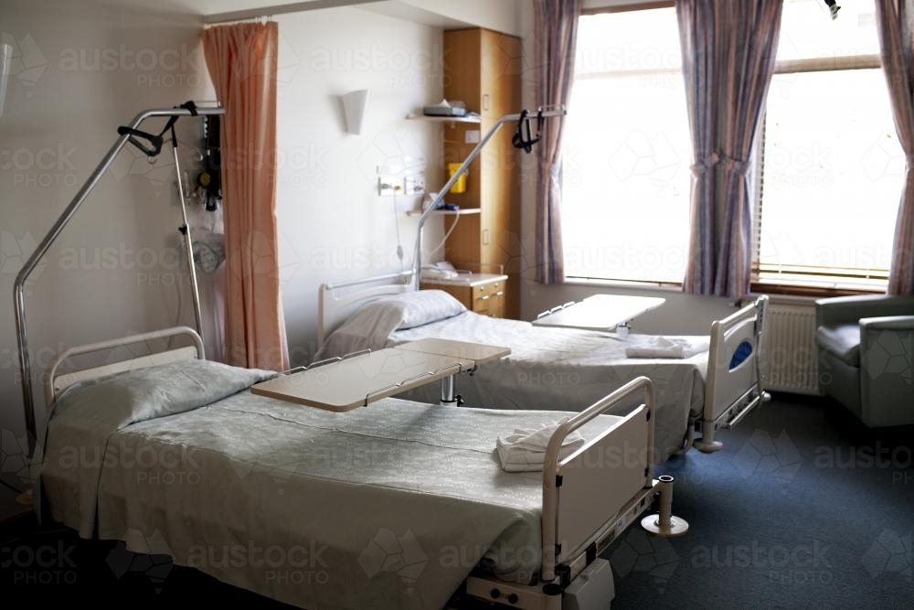 An empty hospital ward with two single beds - Australian Stock Image