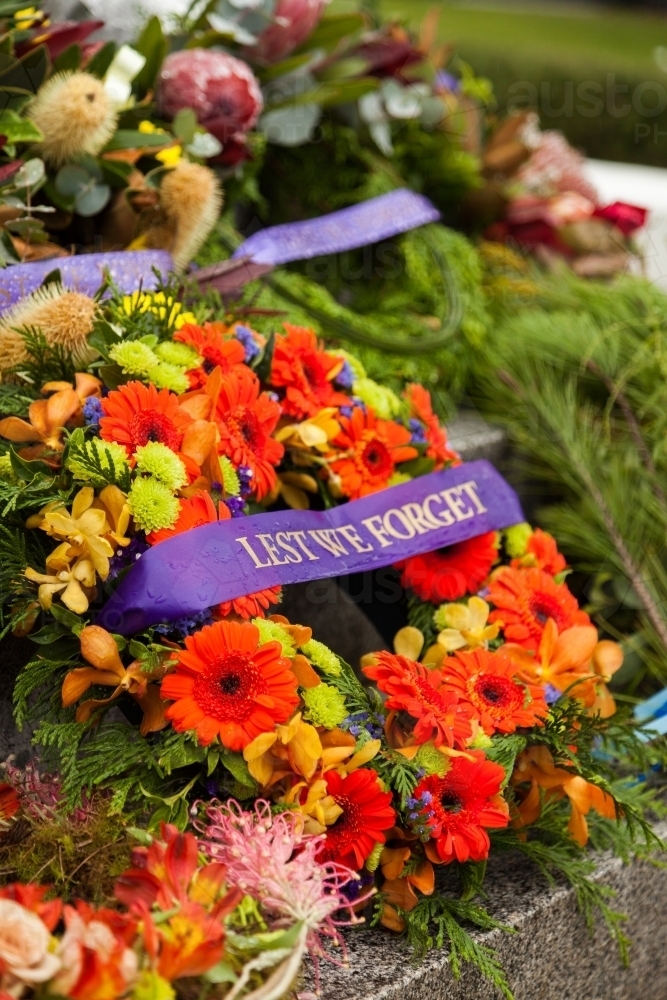 ANZAC day wreath with lest we forget ribbon laid on cenotaph - Australian Stock Image