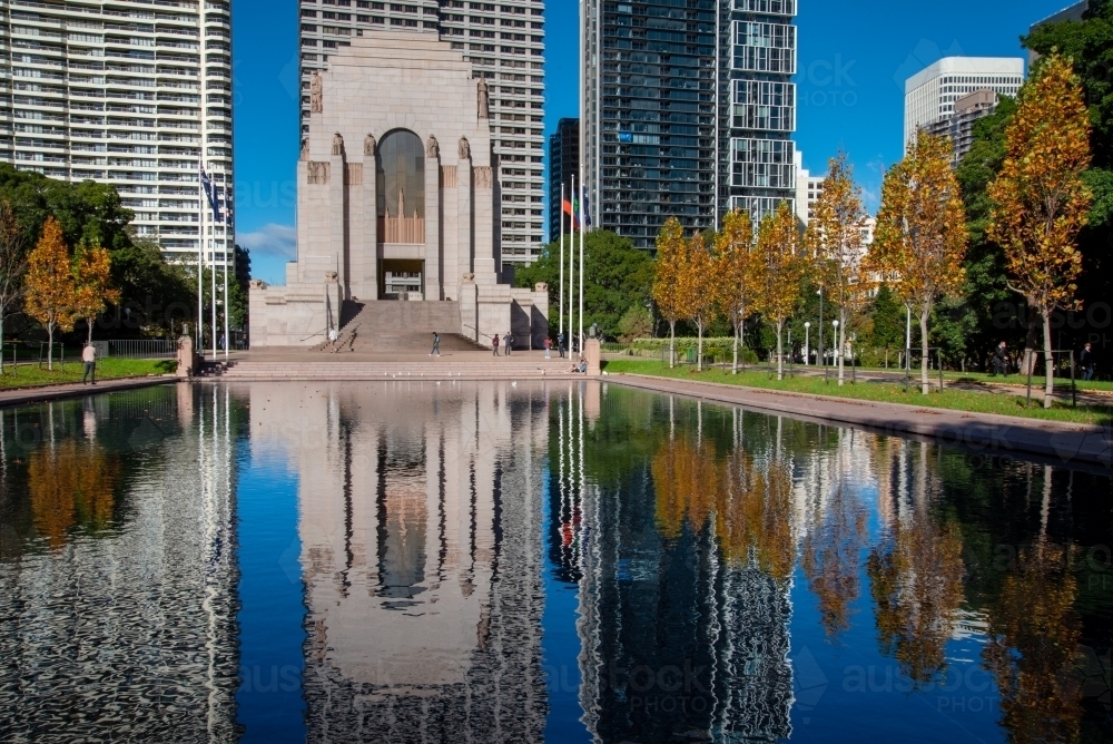 ANZAC Memorial in Hyde Park, Sydney with reflections in pond - Australian Stock Image