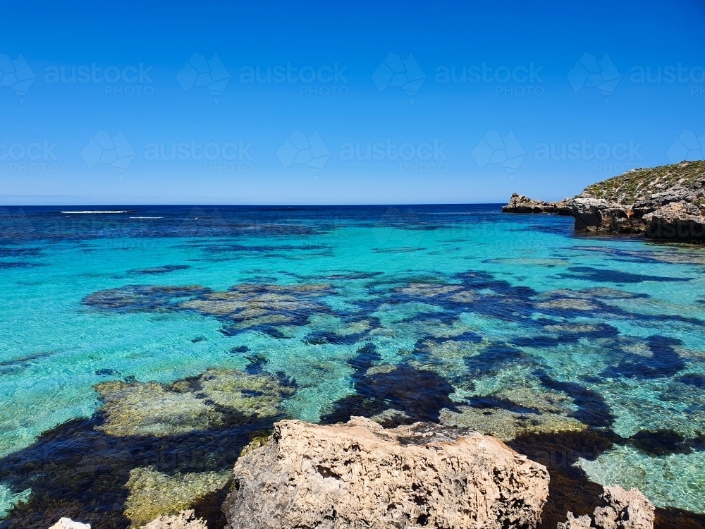 Aqua blue bay with coral on Rottnest Island - Australian Stock Image