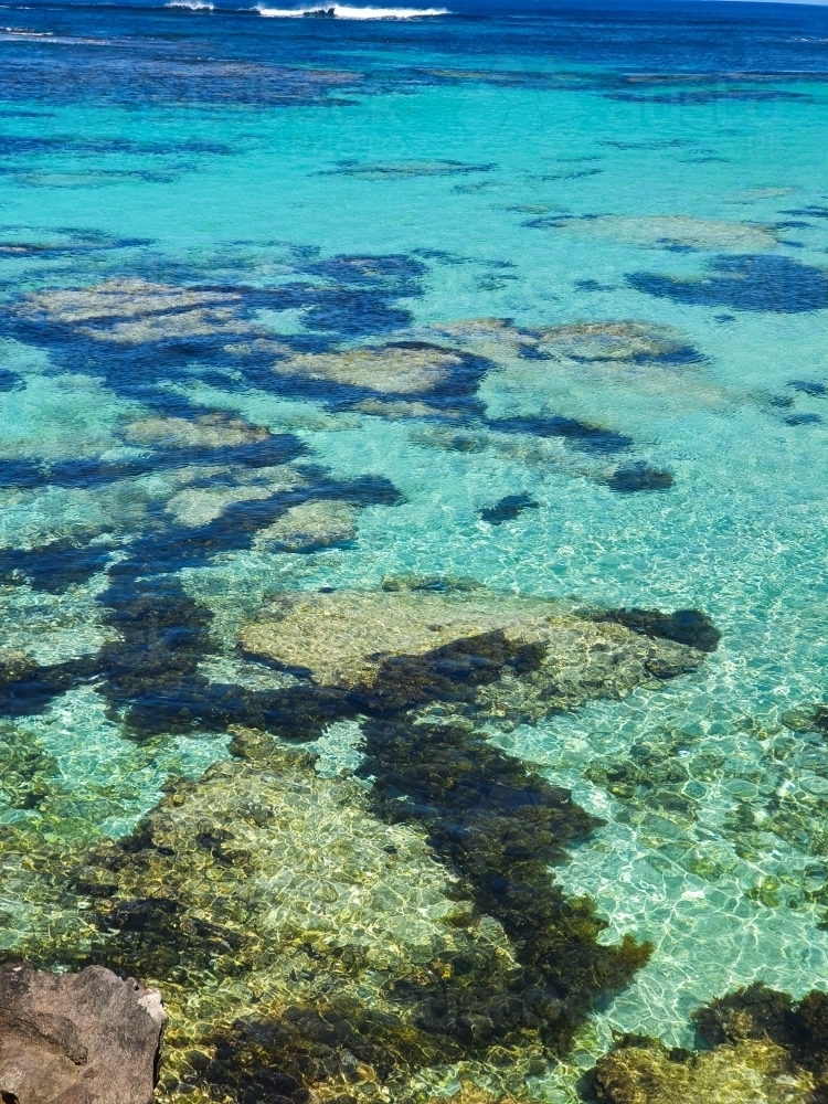 Aqua blue bay with coral on Rottnest Island - Australian Stock Image