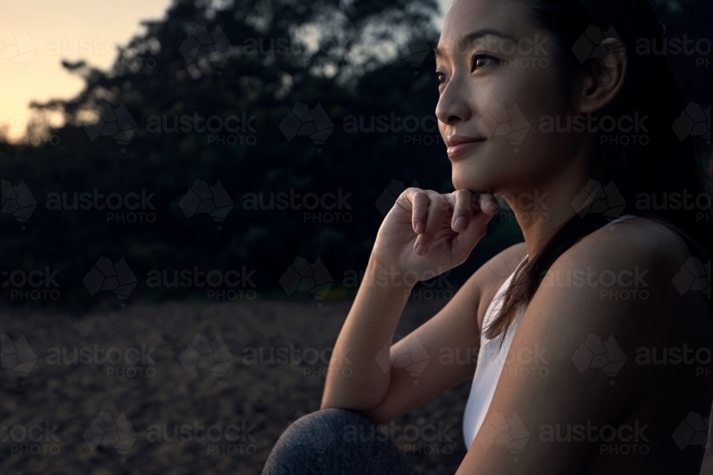 Asian woman in profile - Australian Stock Image