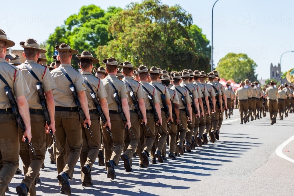 Australian army troops marching on main street at freedom of entry parade in Singleton - Australian Stock Image