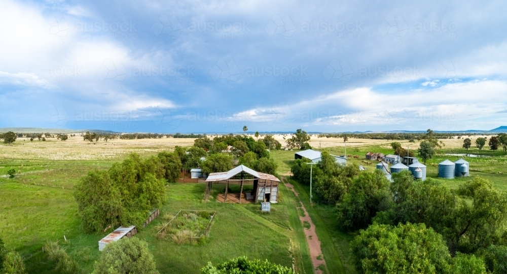 Australian farm scene with old hay shed building  seen from aerial view - Australian Stock Image