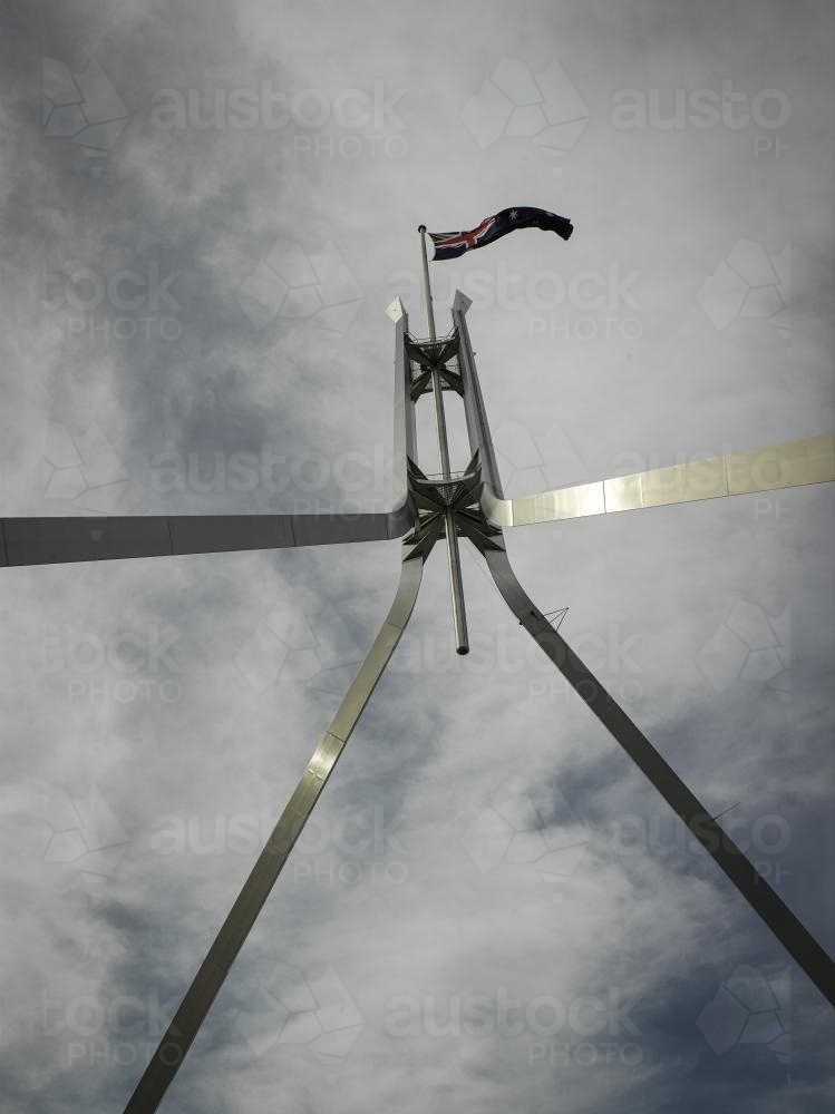 Australian Flag and mast at Parliament House from below - Australian Stock Image