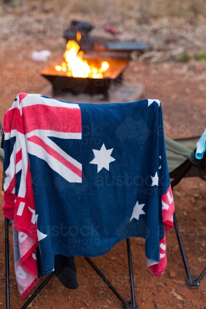 Australian Flag beach towel hanging on a chair at a campsite - Australian Stock Image