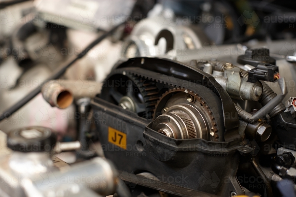 Automotive work on engine of vehicle - Australian Stock Image