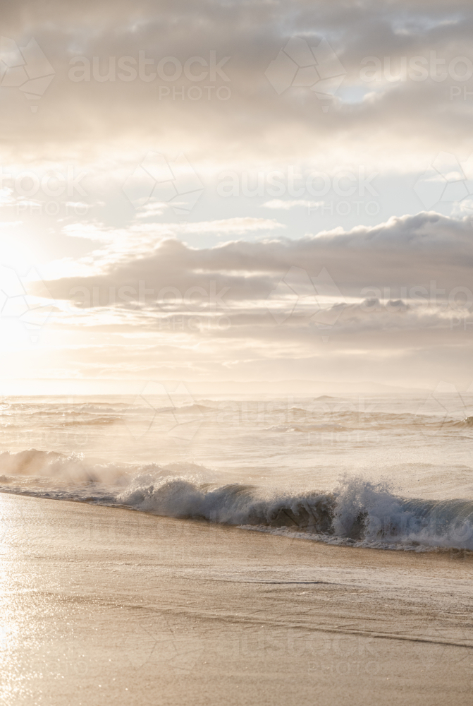 backlit sunrise waves - Australian Stock Image