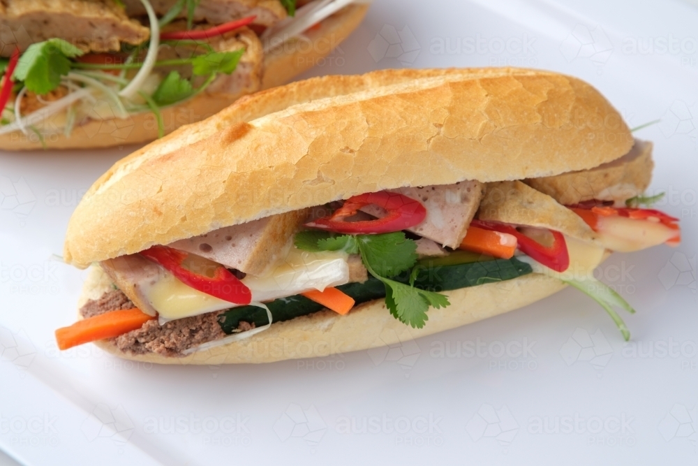 Banh mi on white plastic tray - Australian Stock Image