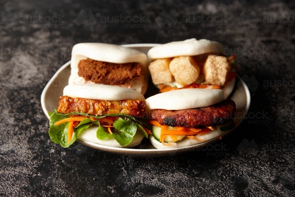 Bao buns on plate - Australian Stock Image