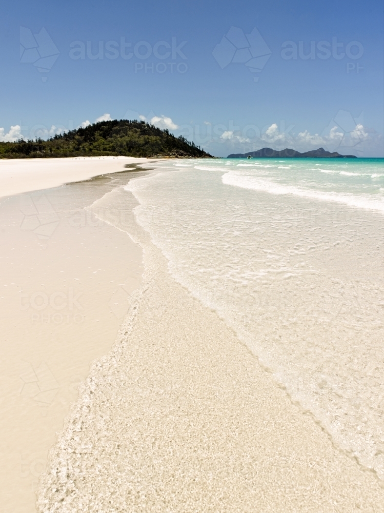 Beach and waves on a tropical island - Australian Stock Image