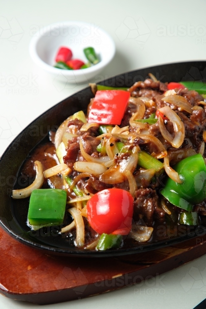 Black pepper sizzling beef - Australian Stock Image