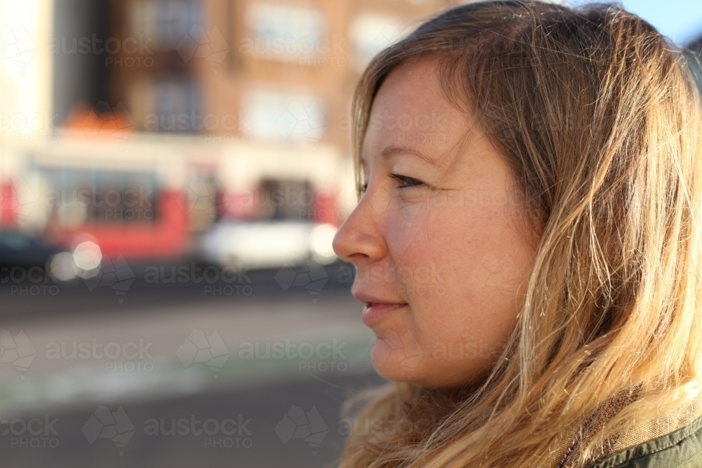 Blonde woman in profile - Australian Stock Image