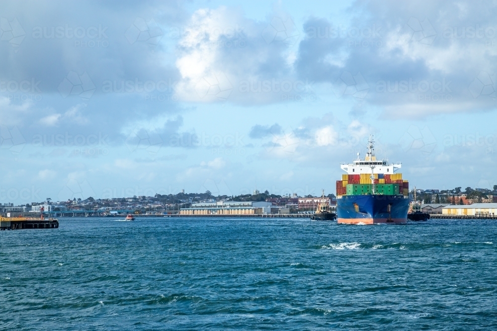 Blue hulled container ship departing Port of Fremantle. - Australian Stock Image