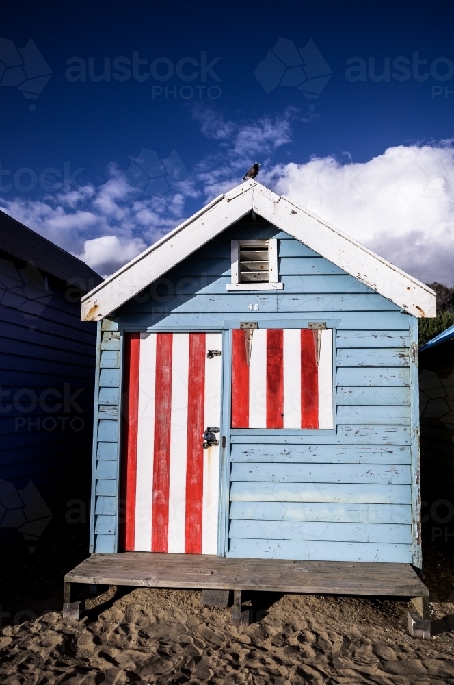 Blue, red and white striped beach box, Melbourne, Victoria - Australian Stock Image