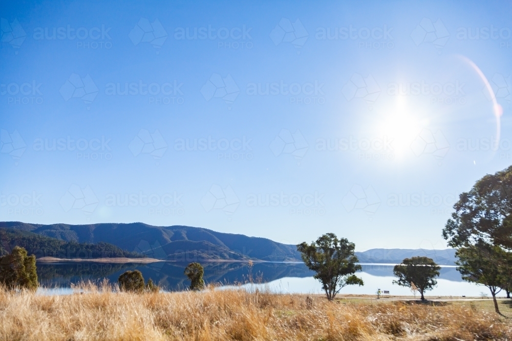 Blue sky and mountains with lake, Blowering Reservoir - Australian Stock Image