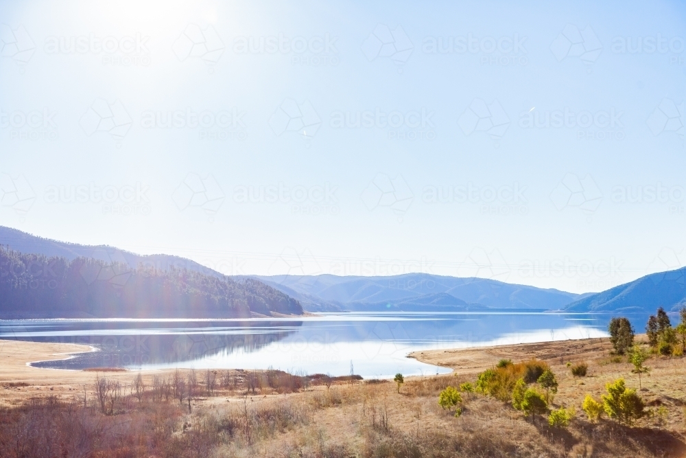 Blue sky and mountains with lake, Blowering Reservoir - Australian Stock Image