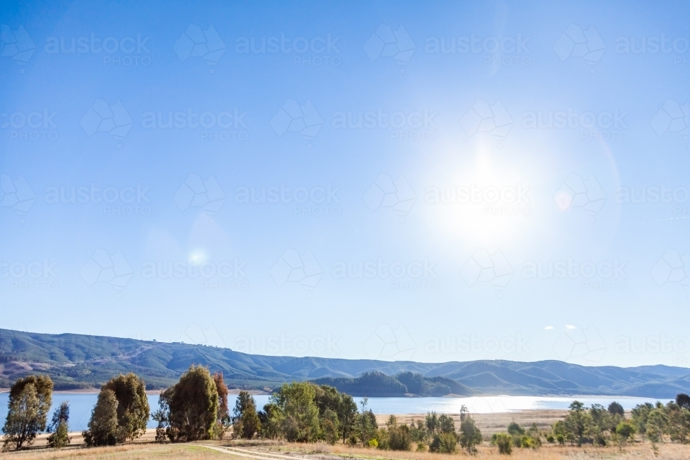 Blue sky and mountains with lake, Blowering Reservoir - Australian Stock Image