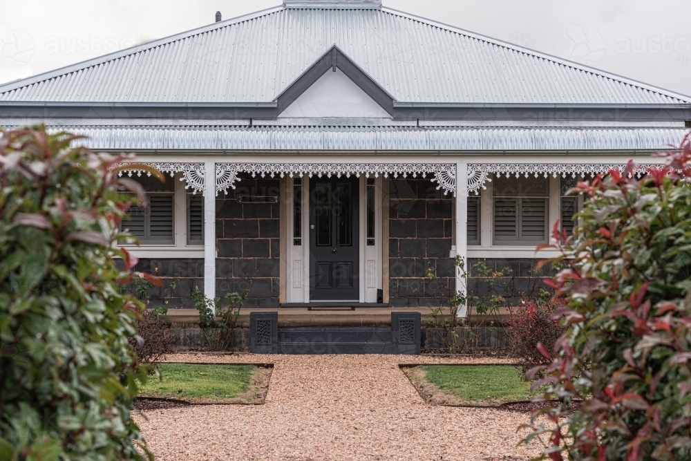 bluestone early victorian country home facade - Australian Stock Image